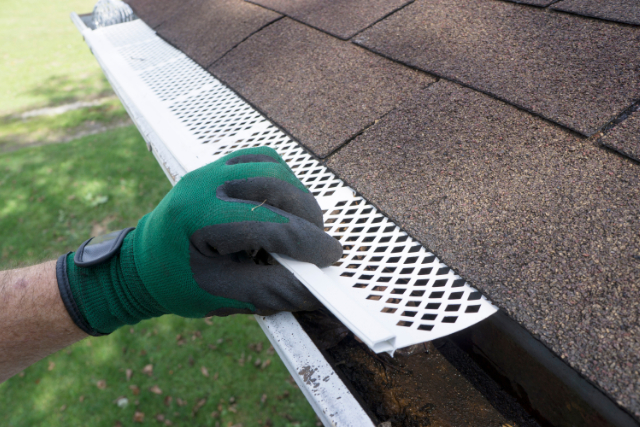 New Gutter Guard Installation in Eugene, OR by worker